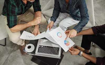 A group of people reviewing financial charts