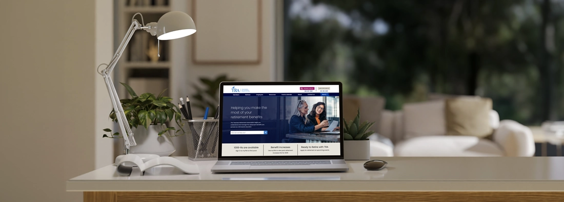 New TRA website displayed on a laptop at a desk 